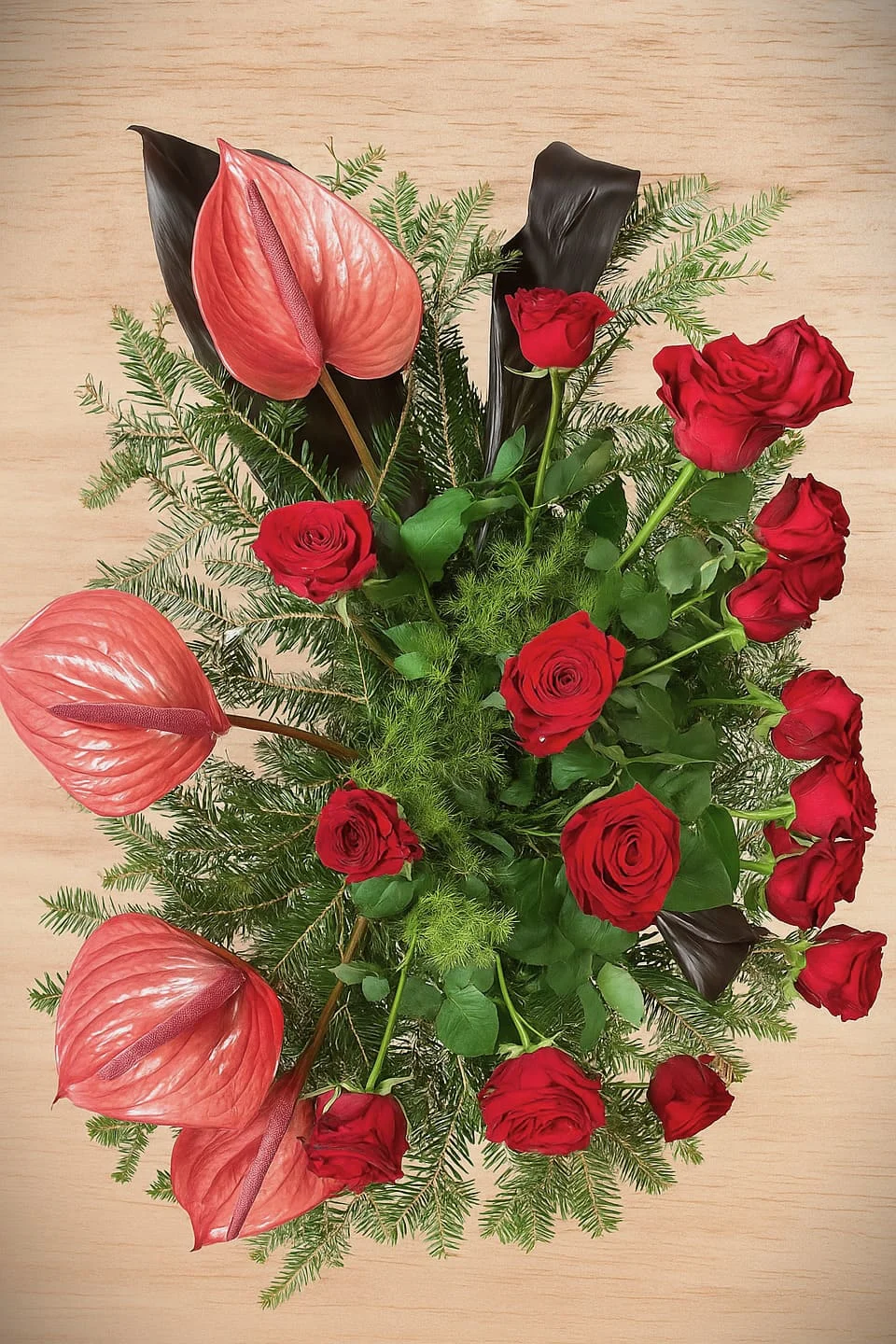 Wiązanka pogrzebowa „Siła wspomnień” z czerwonych róż i anturium